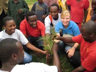 A group prepares to plant a tree.