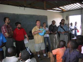 Researchers and students in a classroom